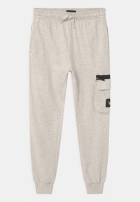 Lichtgrijze sweatpants van een katoenmix, voorzien van een elastische tailleband met trekkoord, taps toelopende benen en een zijvak met rits.