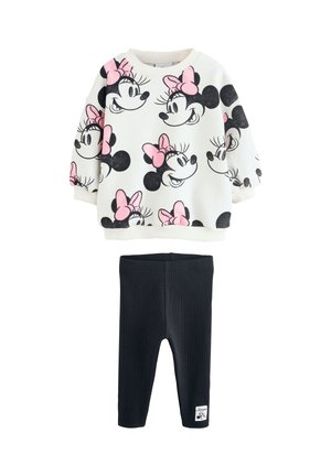 Toddler outfit with white sweatshirt featuring multiple Minnie Mouse faces with pink bows and black leggings with a small Minnie patch.