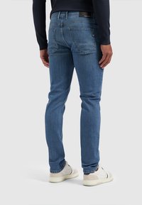 Pure Path Slim fit jeans - denim mid blue