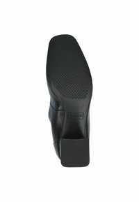 Semelle de chaussure en cuir noir avec une surface texturée et à motifs, et un talon rectangulaire. Présente le logo et l'empreinte de taille 37.