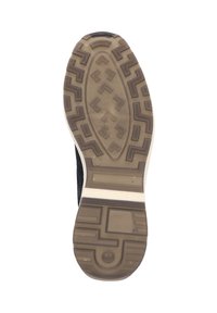 Semelle de chaussure de sport noire avec motif de traction en caoutchouc, dotée d'une semelle extérieure beige et d'une bande médiane blanche pour le confort et le soutien.