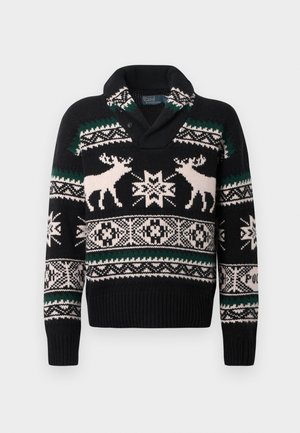 Black knit sweater with white and green Nordic patterns, featuring two white reindeer and geometric snowflake designs on chest and sleeves.