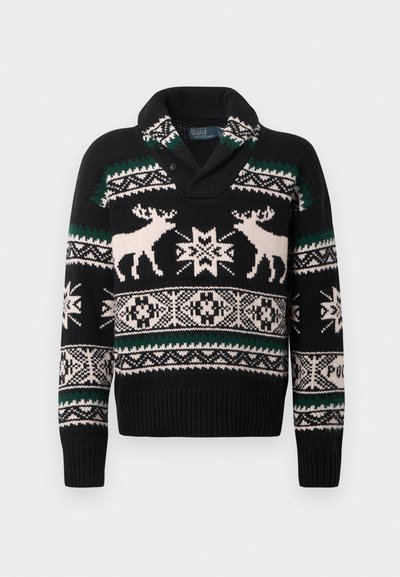 Μαύρο πλεκτό πουλόβερ με λευκά και πράσινα νορβηγικά σχέδια, με δύο λευκούς τάρανδους και γεωμετρικά σχέδια νιφάδας χιονιού στο στήθος και τα μανίκια.