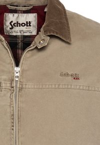Beige Baumwolljacke mit einem Cordkragen, silberner Reißverschluss und gesticktem "Schott"-Logo. Futter aus rot-schwarz проверил kario. 