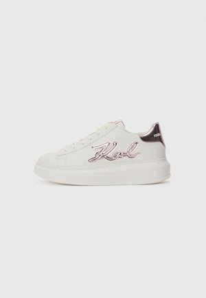 White sneaker with a smooth leather upper, featuring pink and silver "Karl" embroidery, a rounded sole, and a contrasting heel accent.