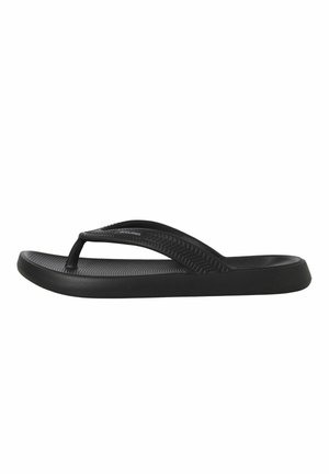 Chancla de goma negra con plantilla texturizada y tiras con patrón de espiga, suela plana y pala de estilo flip-flop.