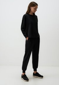 Jimmy Key HIGH WAIST JOGGER  - Trainingsbroek - black