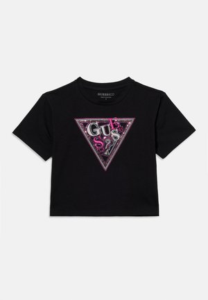 Czarny t-shirt z krótkim rękawem z różowo-srebrnym trójkątnym logo "GUESS 81" ozdobionym cekinami na środku przodu.