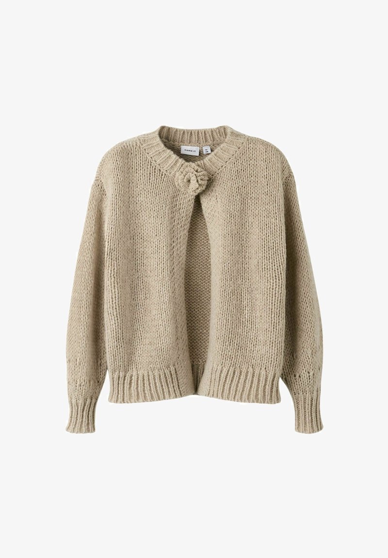 Beige knitted cardigan with a round neckline, open front, and a decorative knot detail at the closure. Features long sleeves and ribbed cuffs.
