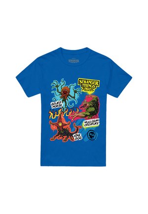 Blue Stranger Things t-shirt with colorful creature illustrations labeled Gourd Horde, Vine Dog, and Mulligan Creature.