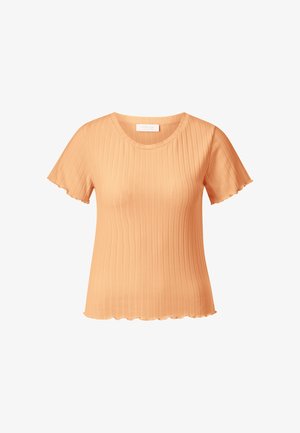 Persiku krāsas ribota īss piedurkņu topiņš ar viļņotām malām piedurknēs un apakšējā malā, apaļa kakla izgriezuma.