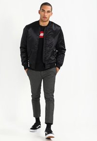 Levi's® GRAPHIC CREW - Langærmet T-shirt - better black