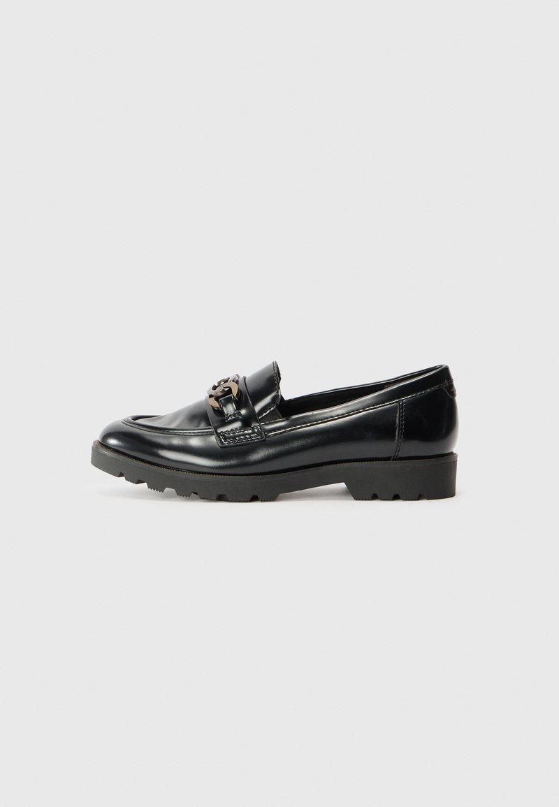 Black leather loafers with a glossy finish, featuring a decorative hardware accent and a thick, textured rubber sole.