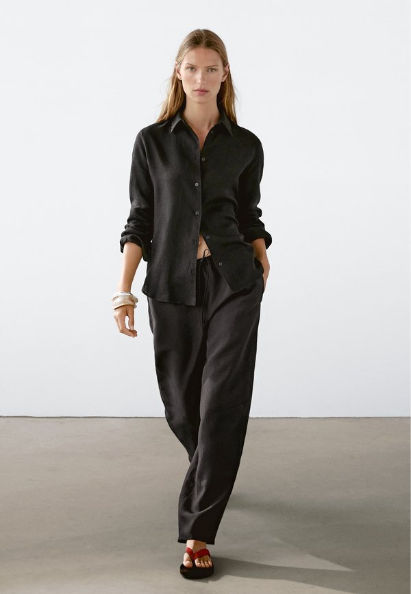 FLOWING BARREL FIT - Trousers2