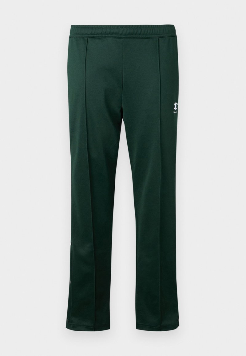Donkergroene sportbroek van een gladde stof, met een rekbare tailleband en zijknopen voor aanpassing.