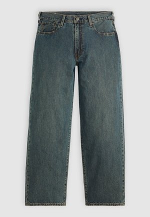 Blå denim jeans med lige ben, fem lommer og knaplukning. Fadede tekstur med synlige sømme langs sømmen.