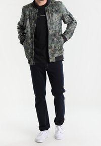 The North Face Hardshelljacke - olive