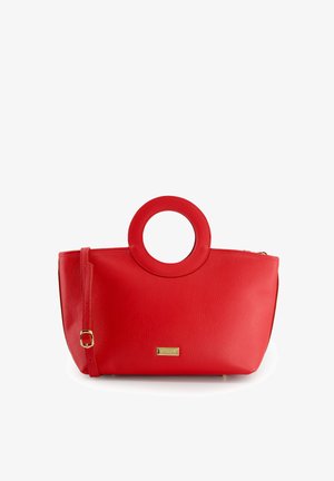 Red leather handbag with a round top handle, textured finish, gold logo accent, and a detachable strap. Features a zip closure.