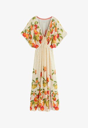 Lang cremefarvet kjole med vide ærmer og et farverigt print af appelsiner, citroner og grønne blade, med dyb V-udskæring og indsnævret talje.