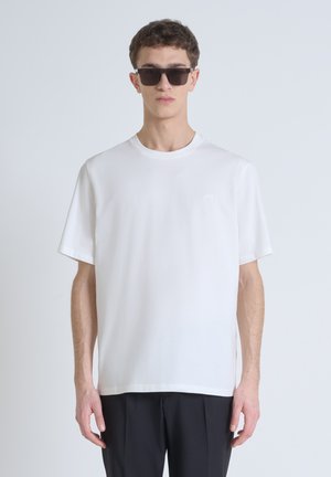 White cotton t-shirt with a classic fit, round neckline, short sleeves, and a small embroidered logo on the left chest.