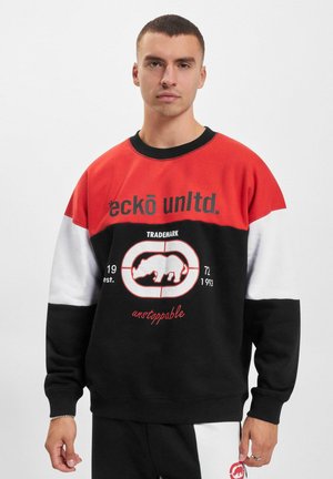 Black, red, and white sweatshirt with a crew neck, featuring a bison graphic, logo text, and contrasting color blocks on sleeves.