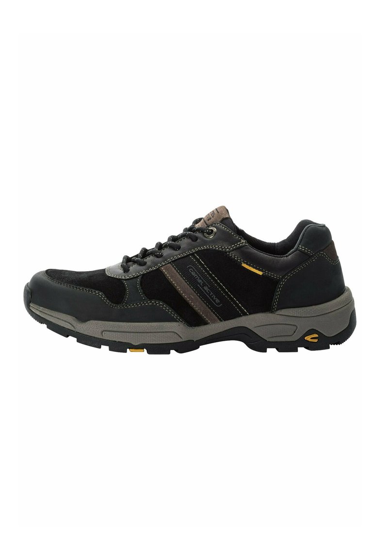 Black sneaker with suede and synthetic leather, featuring gray accents and yellow details, rounded toe, lace-up design, and textured sole.