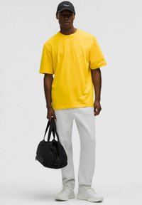 lululemon HEAVYWEIGHT JERSEY - Camiseta básica - yellow