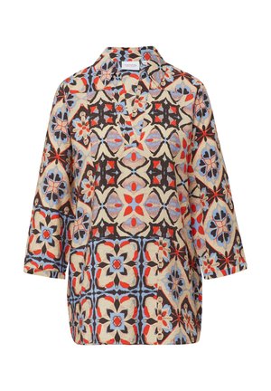 Patterned shirt featuring a collared neckline, 3/4 sleeves, in beige with intricate floral designs in red, blue, and black.