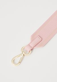 Tommy Hilfiger LOGOTAPE SADDLE BAG - Cross body bag - pink