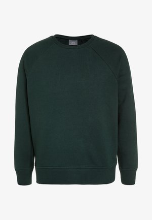 Sweat-shirt à col rond vert foncé avec manches longues et poignets et ourlet côtelés, étiqueté "Next school" à l'intérieur du col.