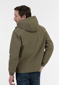 Olive green hooded jacket with elastic cuffs and a subtle sheen. Features a zipped pocket on the left sleeve. Smooth texture, casual design.