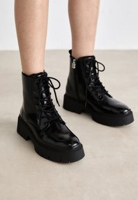 KRIS - Platform ankle boots - black one