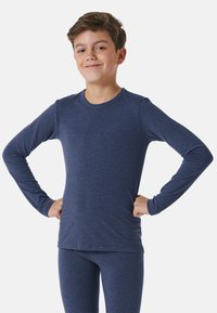 Long-sleeve, navy thermal top made from soft, stretchy fabric. Crew neck design with a fitted silhouette, paired with matching pants.