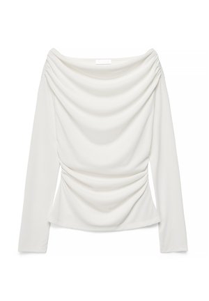 Blouse blanche à manches longues avec décolleté drapé et fronces subtiles aux épaules et à la taille, présentée à plat sur un fond blanc.