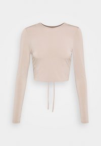 Light beige long-sleeve cropped top with a round neckline and drawstring detail at the hem. Made of smooth, slightly glossy fabric.
