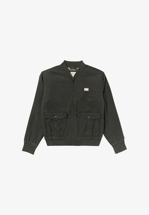 Giacca bomber verde scuro realizzata in misto cotone, con zip frontale, polsini a coste, due tasche anteriori a patta e una piccola patch con logo.