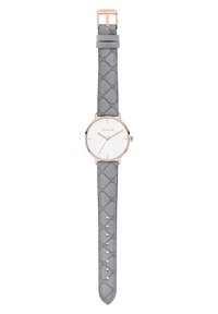 Montre ronde avec un cadran blanc, un boîtier doré et un bracelet en cuir beige clair avec motif, doté d'une boucle ardillon et de plusieurs trous d'ajustement.
