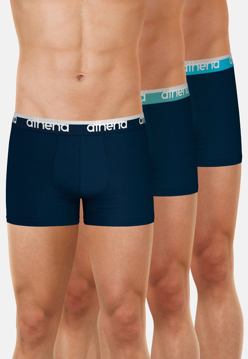 Trois paires de boxers bleu marine avec des ceintures légères mettant en avant le nom de la marque. Fabriqués en tissu lisse, ils ont un design ajusté.