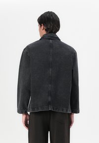 Marimekko POWERI UNISEX - Jakna iz džinsa - washed black