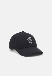 Black cotton cap featuring a white embroidered bird design on the front, with a curved brim and adjustable strap at the back.
