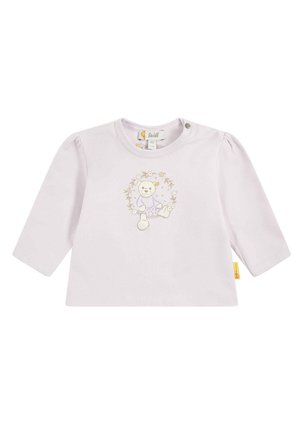 Camicia a maniche lunghe di colore rosa chiaro in cotone con maniche a sbuffo, caratterizzata da una grafica di un orso circondata da disegni floreali e chiusura a bottoni snap.