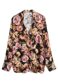 Blusa floreale con maniche lunghe, sfondo nero, caratterizzata da grandi fiori rosa e gialli, tessuto morbido e vestibilità ampia con tasca.