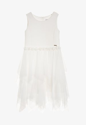 Robe blanche sans manches avec corsage ajusté, bordure florale à la taille et jupe asymétrique en voile superposé.