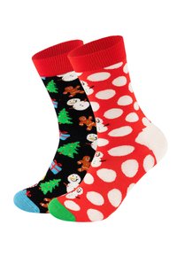 Koksokker med svart design med julmotiver og røde sokker med hvite prikker. Stripete mansjett og kontrastfarget tå.