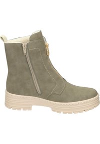 Bottines en suede vert avec des zips latéraux doubles, semelle en caoutchouc beige, accents de couture et doublure intérieure douce pour plus de chaleur.