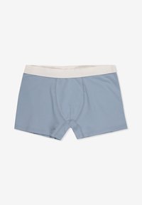 Niebieskie bawełniane szorty kąpielowe z kremowym elastycznym pasem, z wyprofilowaną kieszonką i gładkim, elastycznym materiałem zapewniającym komfort.