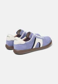 Light purple suede shoes with white accents, black stripe, elastic laces, and brown rubber sole, featuring a comfortable rounded design.
