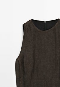 Sleeveless, textured dress in brown and black, featuring a round neck and a back zipper closure. The fabric has a subtle woven pattern.