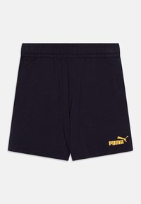 Shorts de algodón azul marino con cinturilla elástica. Presenta un logo amarillo de PUMA en la parte inferior izquierda del frente, con una textura suave.