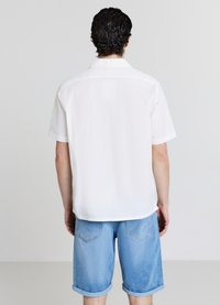 Calliope MEDIO - Shorts di jeans - blu denim medio